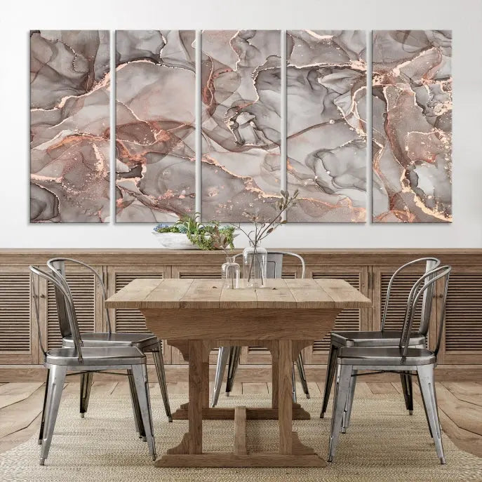 The Rose Gold Marble Fluid Effect Wall Art Abstract Canvas Wall Art Print is an exquisite three-panel creation crafted on museum-quality canvas. It features swirling marbled patterns in shades of gray, copper, and beige. Complete with a UV-protective coating, this ready-to-hang artwork promises to be a timeless addition to any space.