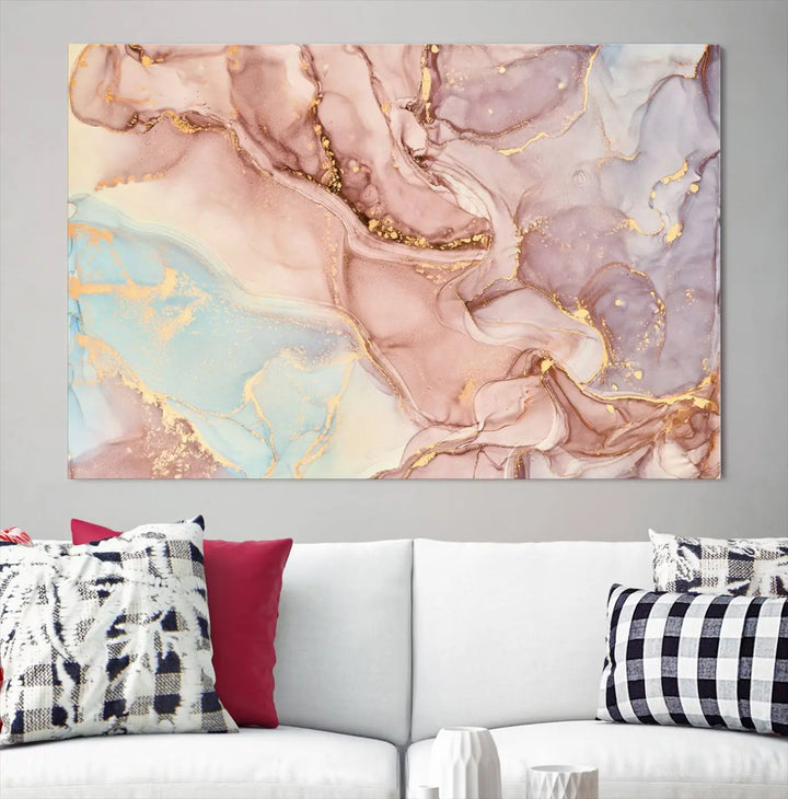 The Rose Gold Marble Fluid Effect Wall Art Abstract Canvas Wall Art Print features stunning pink, blue, and gold streaks to add elegance to your room. Enjoy the museum-quality canvas that resists fading thanks to its UV-protective coating, ensuring lasting beauty.