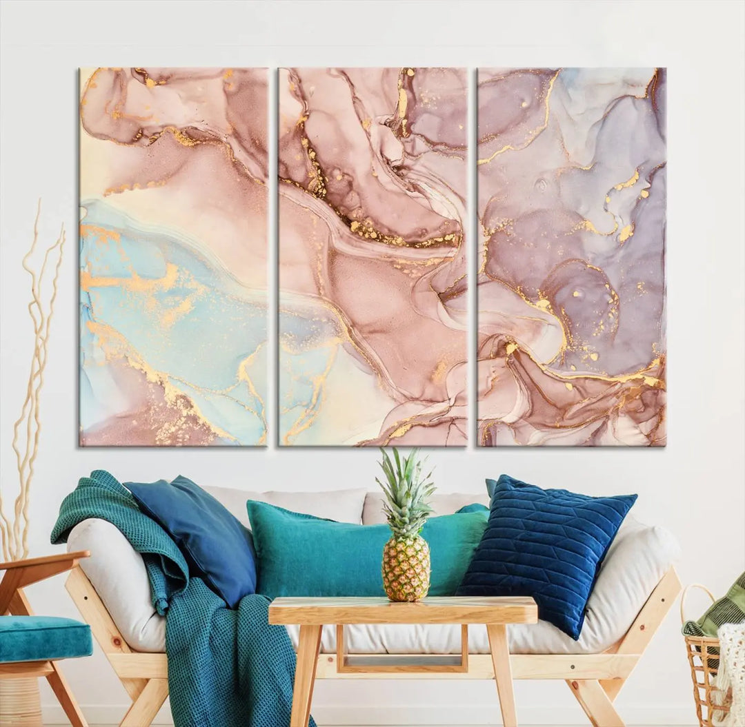 The Rose Gold Marble Fluid Effect Wall Art Abstract Canvas Wall Art Print features stunning pink, blue, and gold streaks to add elegance to your room. Enjoy the museum-quality canvas that resists fading thanks to its UV-protective coating, ensuring lasting beauty.