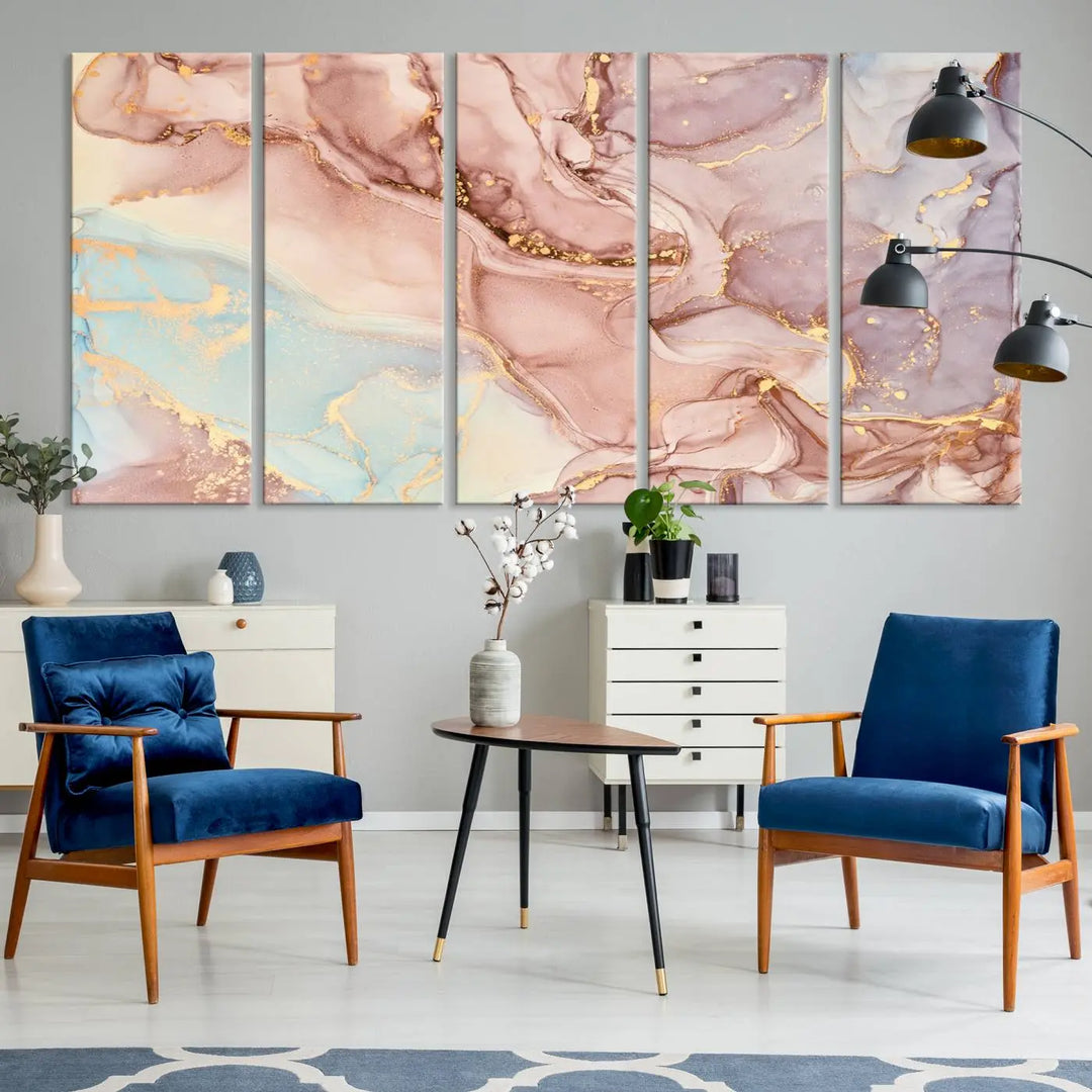 The Rose Gold Marble Fluid Effect Wall Art Abstract Canvas Wall Art Print features stunning pink, blue, and gold streaks to add elegance to your room. Enjoy the museum-quality canvas that resists fading thanks to its UV-protective coating, ensuring lasting beauty.