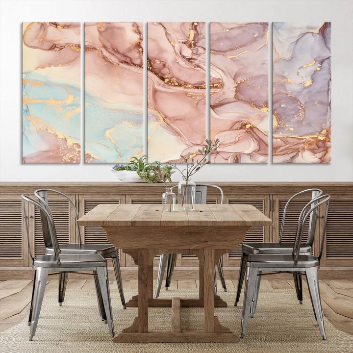 The Rose Gold Marble Fluid Effect Wall Art Abstract Canvas Wall Art Print features stunning pink, blue, and gold streaks to add elegance to your room. Enjoy the museum-quality canvas that resists fading thanks to its UV-protective coating, ensuring lasting beauty.