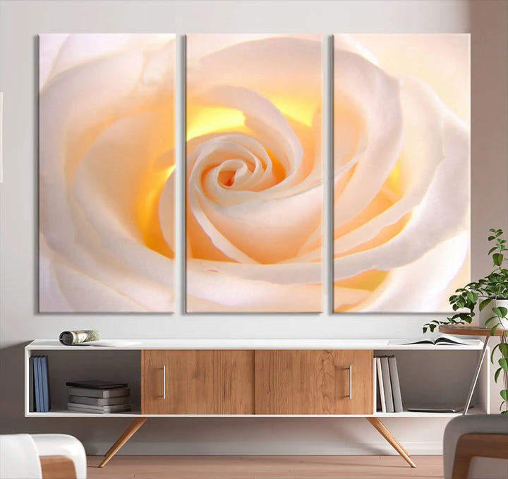 The Rose Wall Art Canvas Print, a triptych featuring a white rose gallery wrapped on museum-quality canvas with UV-protective coating, is displayed prominently.