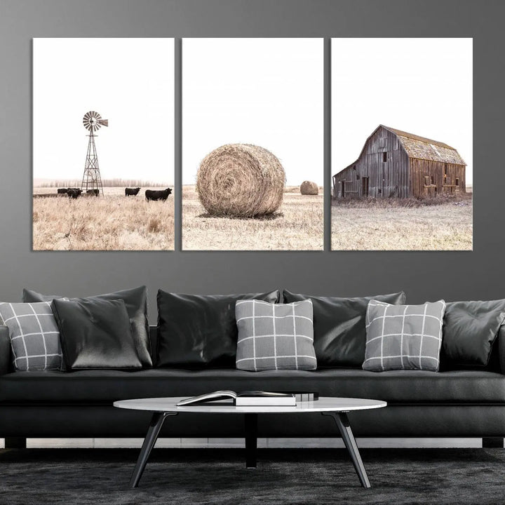 A captivating art set titled "Rustic Farmhouse Wall Art Set of 3 – Country Barn and Wheat Field" adorns the room. These farm prints, depicting a windmill, cattle, hay bale, and weathered barn by a serene wheat field, beautifully enhance the country home and gallery wall decor.