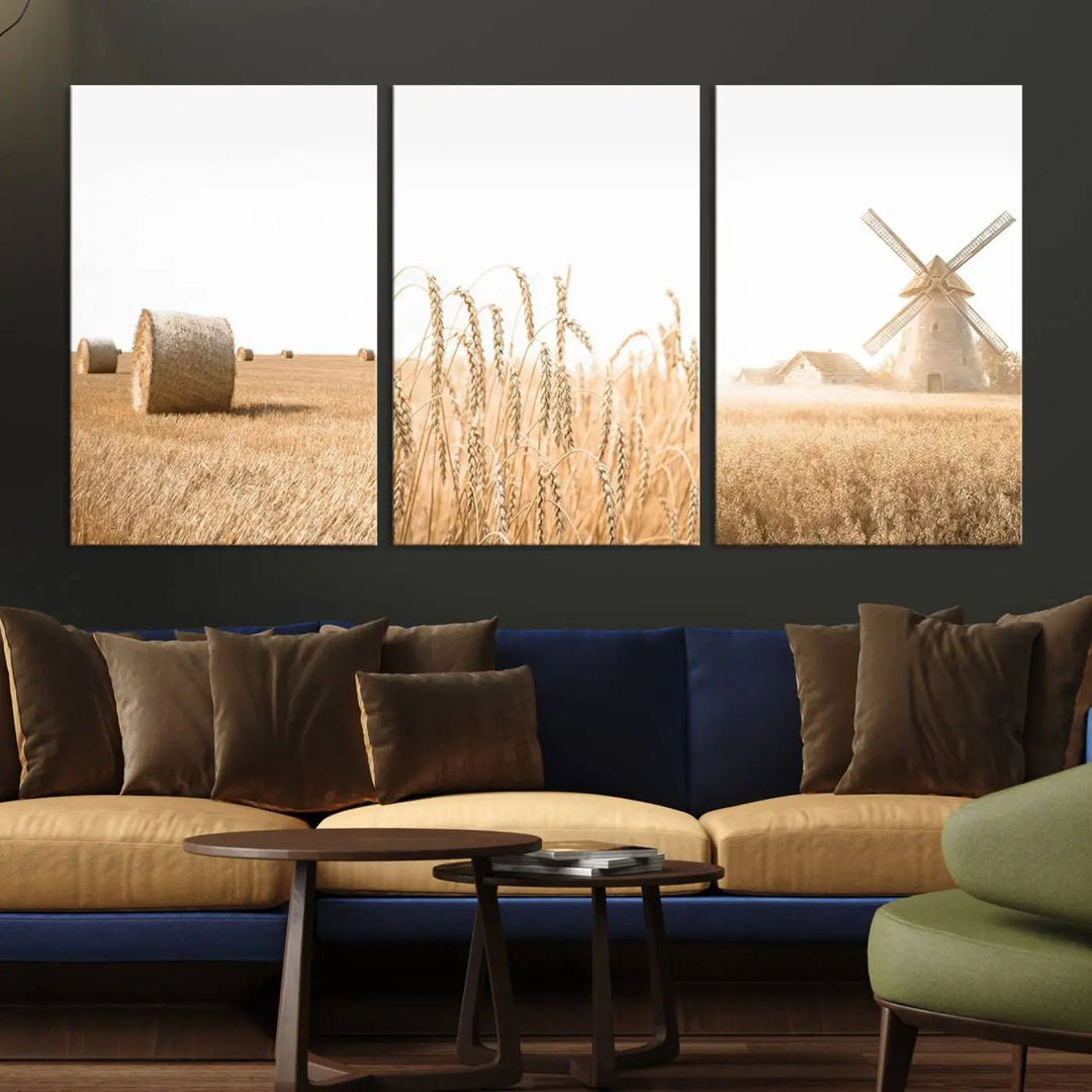 The minimalist room is enhanced by the "Rustic Farmhouse Wheat Fields and Windmill Wall Art Canvas Print," which showcases a scene with hay bales, wheat, and a windmill.