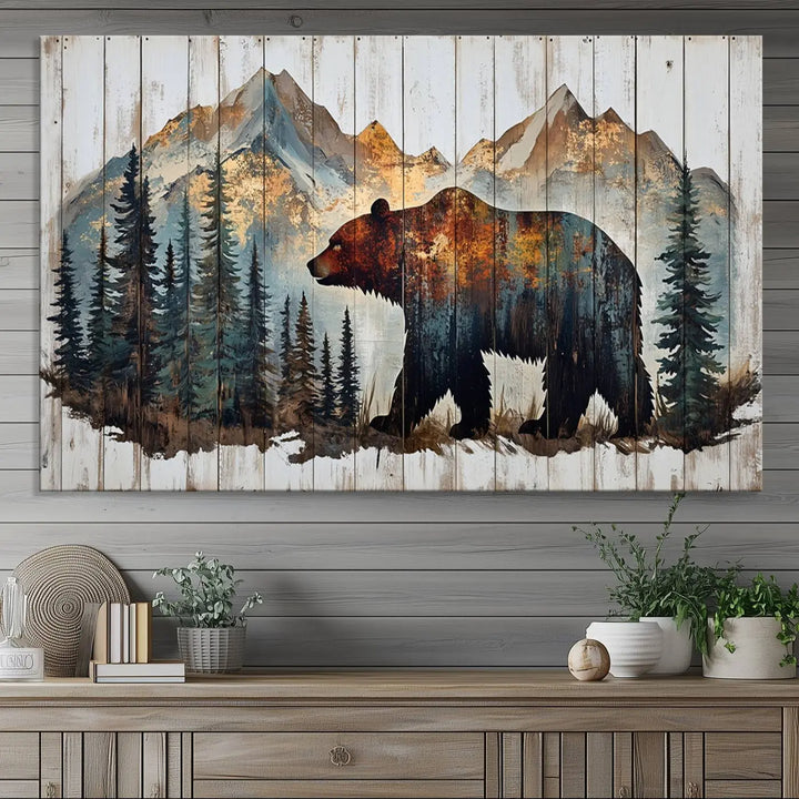 The Rustic Grizzly 399 Bear and Mountain Wood Canvas Wall Art elegantly depicts a majestic bear in a pine forest with mountain silhouettes, expertly framed on distressed wooden panels. This nature-inspired piece infuses charm and warmth, serving as perfect cabin wall decor.