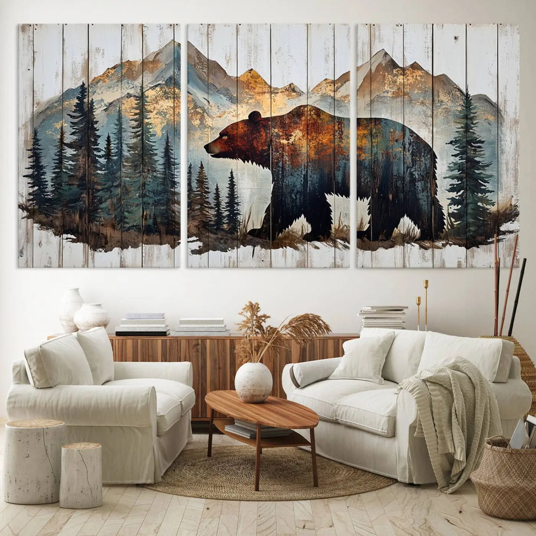 The Rustic Grizzly 399 Bear and Mountain Wood Canvas Wall Art elegantly depicts a majestic bear in a pine forest with mountain silhouettes, expertly framed on distressed wooden panels. This nature-inspired piece infuses charm and warmth, serving as perfect cabin wall decor.