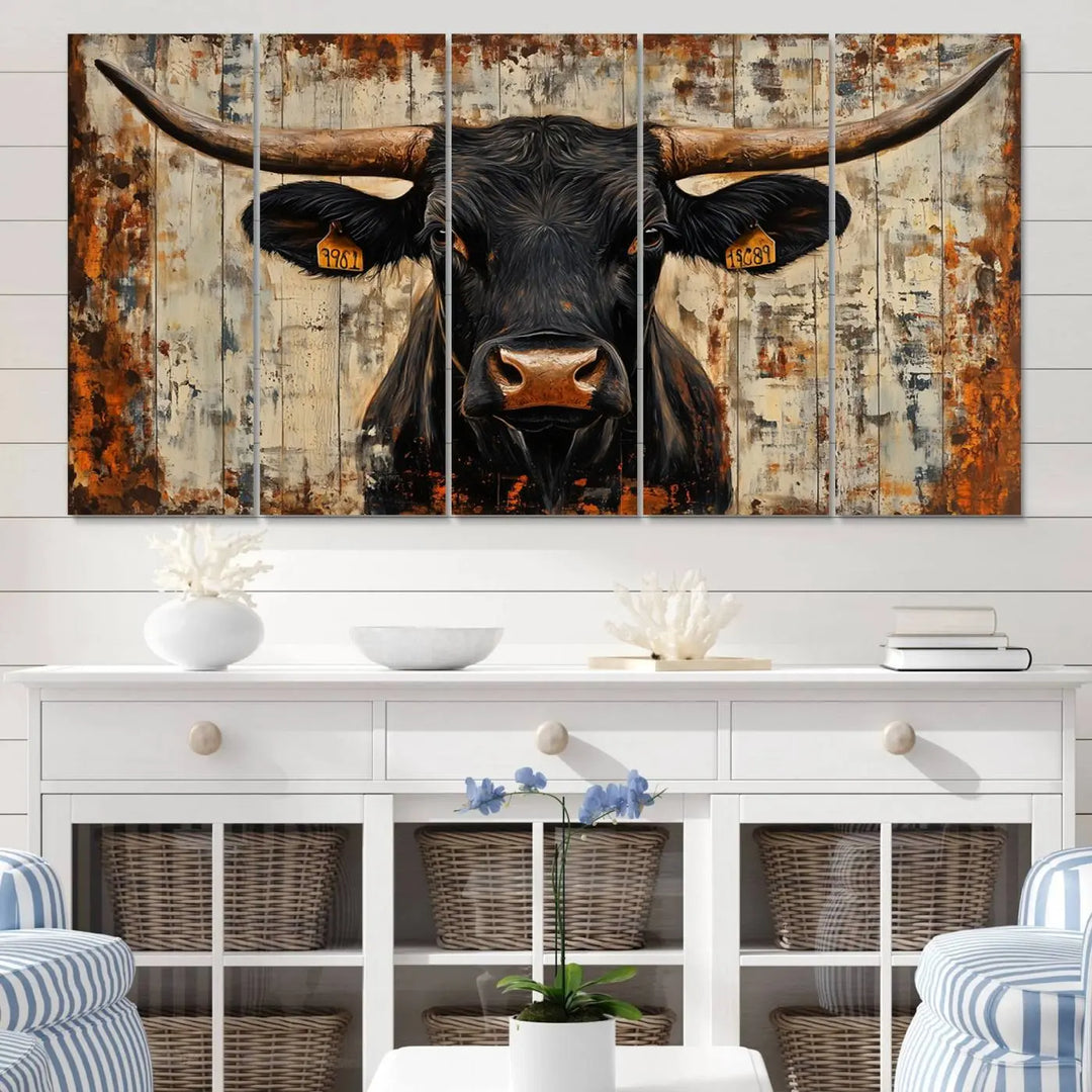 A triptych featuring the "Rustic Texas Artwork Wall Art Canvas Print" showcases an abstract depiction of a majestic longhorn bull with large horns on a textured background, adding a striking touch to the living room. Ideal for enthusiasts of Western home decor.