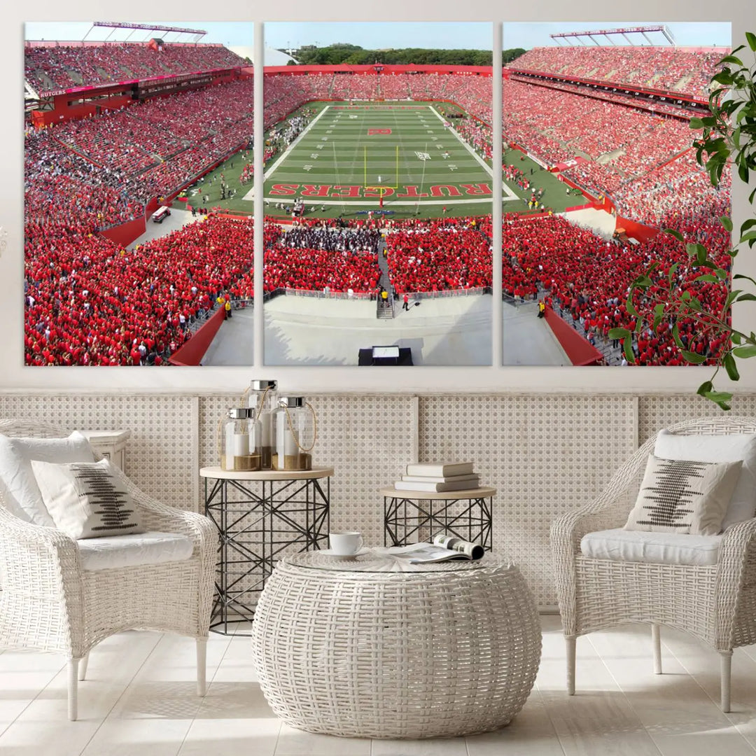 The room features a large wall art piece titled "Rutgers Scarlet Knights Football Team Print - Piscataway SHI Stadium Wall Art Canvas Print." This artwork showcases a vibrant, packed football stadium and boasts a gallery-quality finish on premium canvas, adding an elegant touch to the lively scene.