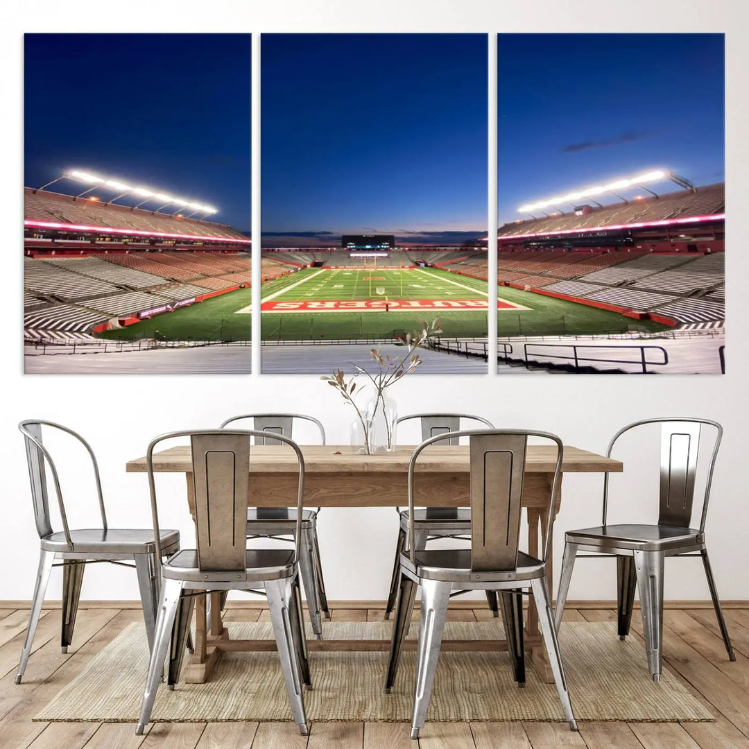 The dining area features a Rutgers Scarlet Knights Football Team Print, depicting the Piscataway SHI Stadium as panoramic wall art. Its premium canvas offers a gallery-quality finish.