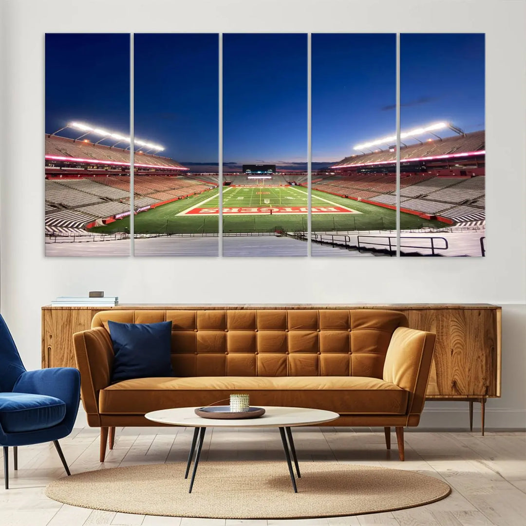 The dining area features a Rutgers Scarlet Knights Football Team Print, depicting the Piscataway SHI Stadium as panoramic wall art. Its premium canvas offers a gallery-quality finish.