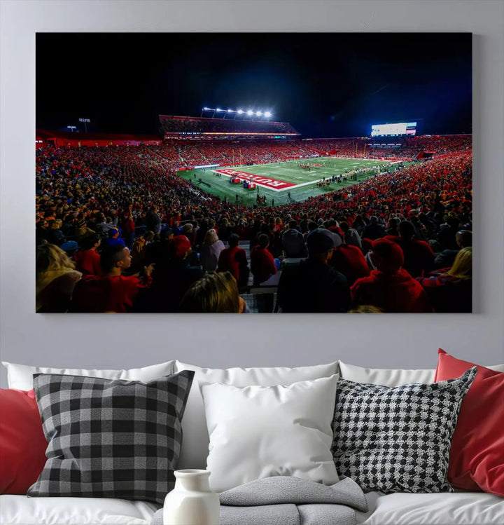 The living room is adorned with a stunning Rutgers Scarlet Knights Football Team Print – SHI Stadium, Piscataway Wall Art Canvas Print. This vibrant stadium scene at night, with its bright lights, offers a gallery-quality finish and adds an elegant touch to the space.