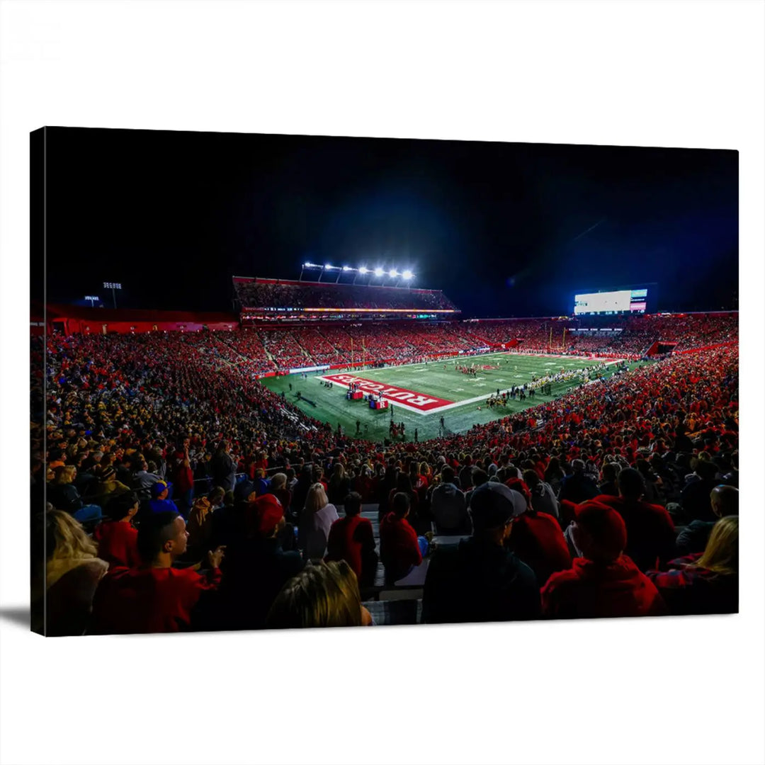 The living room is adorned with a stunning Rutgers Scarlet Knights Football Team Print – SHI Stadium, Piscataway Wall Art Canvas Print. This vibrant stadium scene at night, with its bright lights, offers a gallery-quality finish and adds an elegant touch to the space.