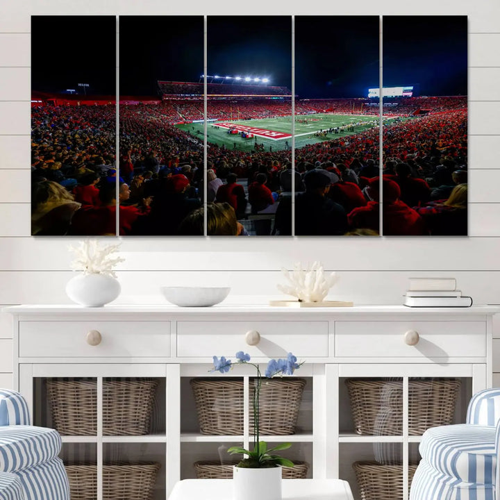 The living room is adorned with a stunning Rutgers Scarlet Knights Football Team Print – SHI Stadium, Piscataway Wall Art Canvas Print. This vibrant stadium scene at night, with its bright lights, offers a gallery-quality finish and adds an elegant touch to the space.