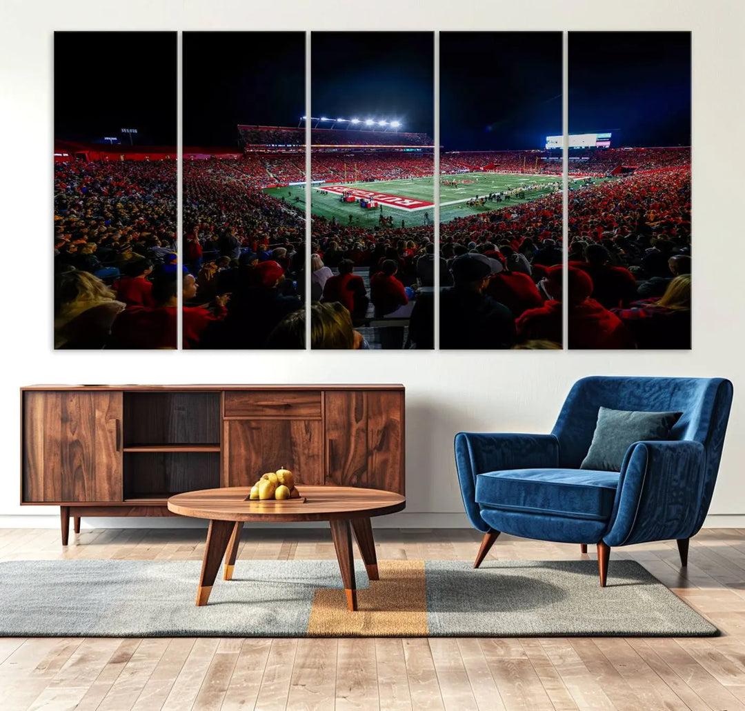 The living room is adorned with a stunning Rutgers Scarlet Knights Football Team Print – SHI Stadium, Piscataway Wall Art Canvas Print. This vibrant stadium scene at night, with its bright lights, offers a gallery-quality finish and adds an elegant touch to the space.