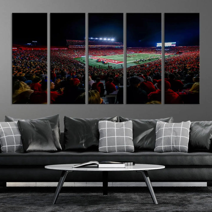 The living room is adorned with a stunning Rutgers Scarlet Knights Football Team Print – SHI Stadium, Piscataway Wall Art Canvas Print. This vibrant stadium scene at night, with its bright lights, offers a gallery-quality finish and adds an elegant touch to the space.