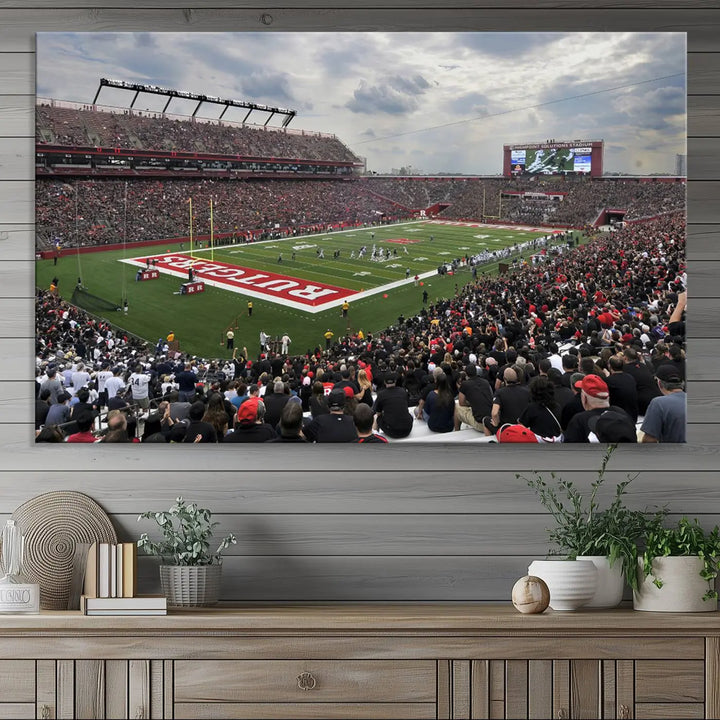 The elegant dining area features a large Rutgers Scarlet Knights Football Team print of SHI Stadium, Piscataway on the wall, boasting a gallery-quality finish.