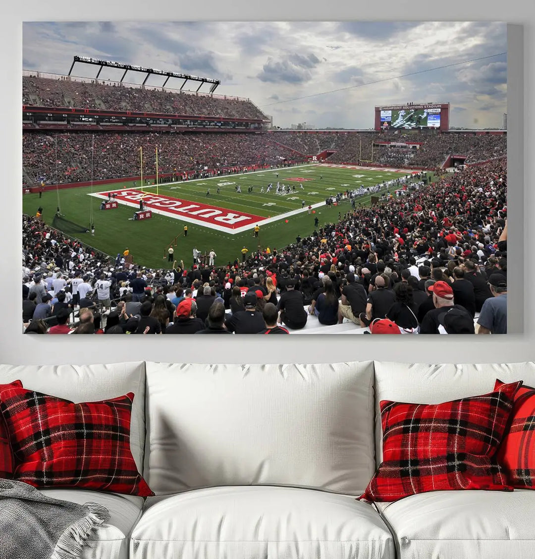 The elegant dining area features a large Rutgers Scarlet Knights Football Team print of SHI Stadium, Piscataway on the wall, boasting a gallery-quality finish.