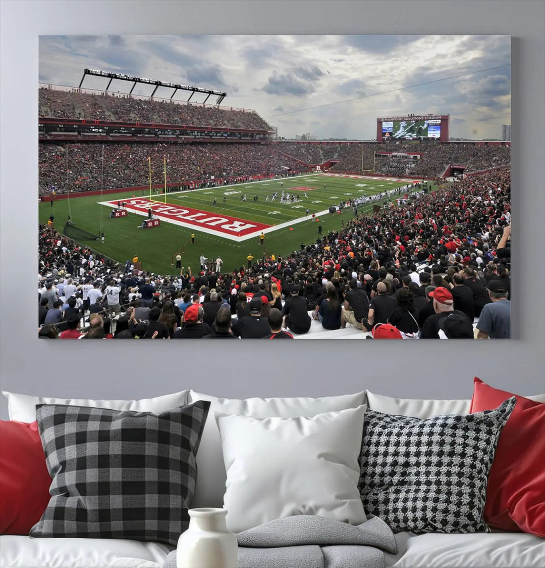 The elegant dining area features a large Rutgers Scarlet Knights Football Team print of SHI Stadium, Piscataway on the wall, boasting a gallery-quality finish.