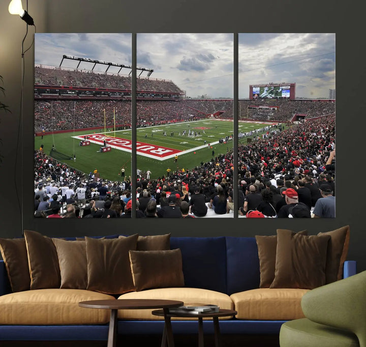 The elegant dining area features a large Rutgers Scarlet Knights Football Team print of SHI Stadium, Piscataway on the wall, boasting a gallery-quality finish.