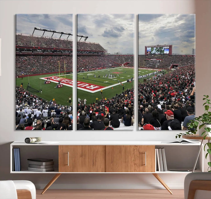 The elegant dining area features a large Rutgers Scarlet Knights Football Team print of SHI Stadium, Piscataway on the wall, boasting a gallery-quality finish.