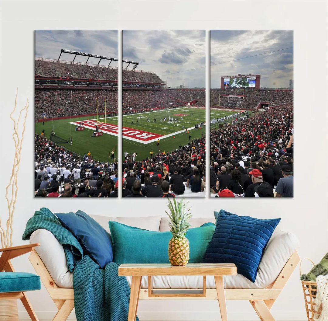 The elegant dining area features a large Rutgers Scarlet Knights Football Team print of SHI Stadium, Piscataway on the wall, boasting a gallery-quality finish.