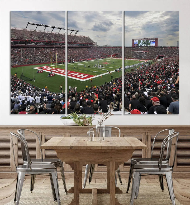 The elegant dining area features a large Rutgers Scarlet Knights Football Team print of SHI Stadium, Piscataway on the wall, boasting a gallery-quality finish.