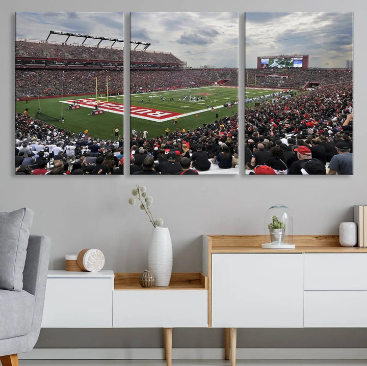 The elegant dining area features a large Rutgers Scarlet Knights Football Team print of SHI Stadium, Piscataway on the wall, boasting a gallery-quality finish.