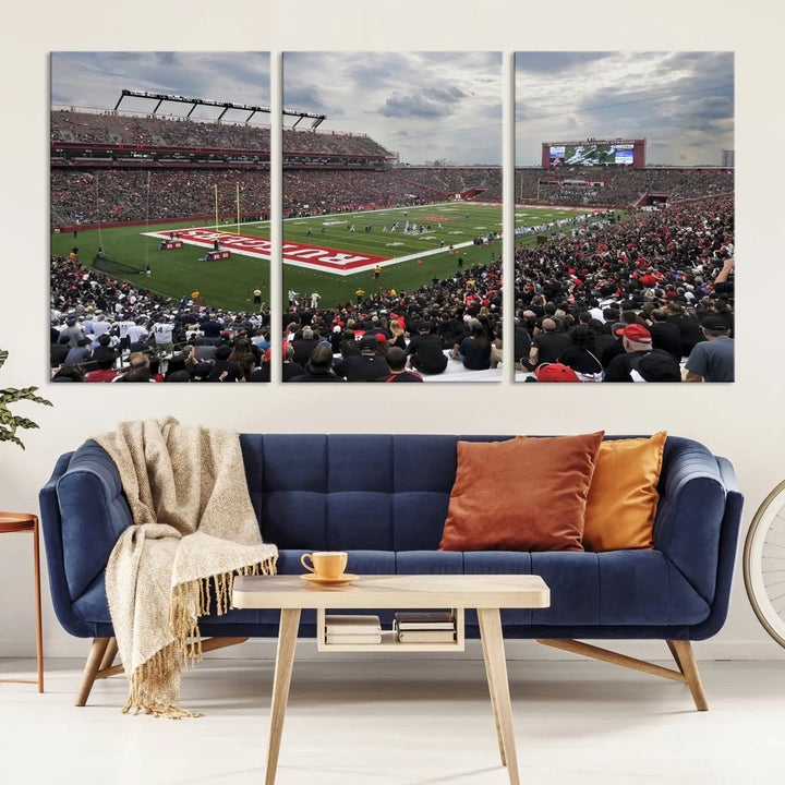 The elegant dining area features a large Rutgers Scarlet Knights Football Team print of SHI Stadium, Piscataway on the wall, boasting a gallery-quality finish.