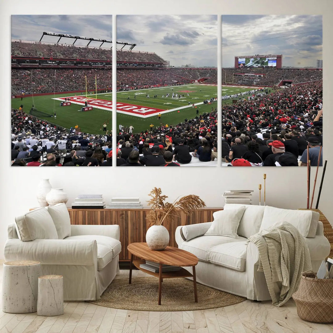 The elegant dining area features a large Rutgers Scarlet Knights Football Team print of SHI Stadium, Piscataway on the wall, boasting a gallery-quality finish.