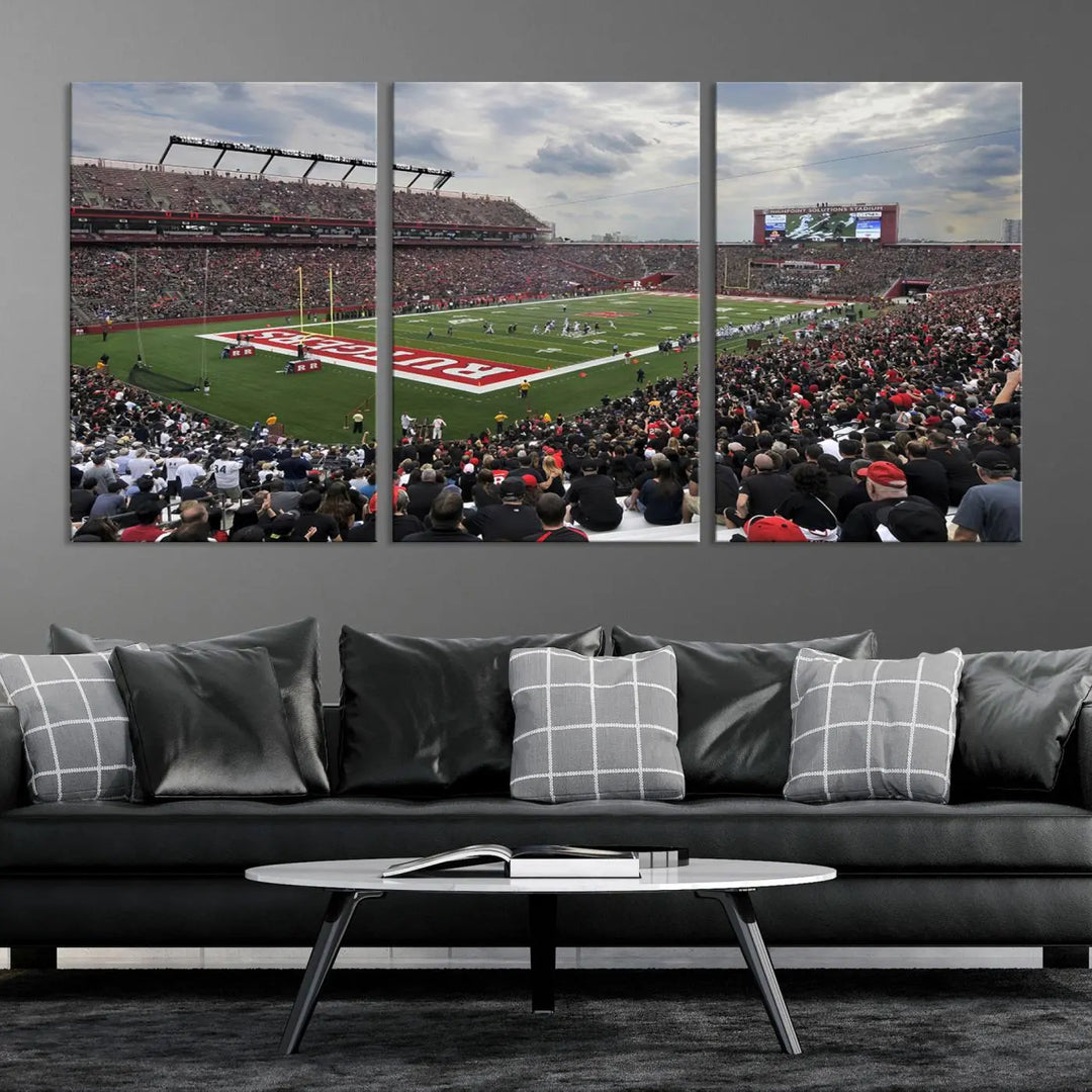 The elegant dining area features a large Rutgers Scarlet Knights Football Team print of SHI Stadium, Piscataway on the wall, boasting a gallery-quality finish.