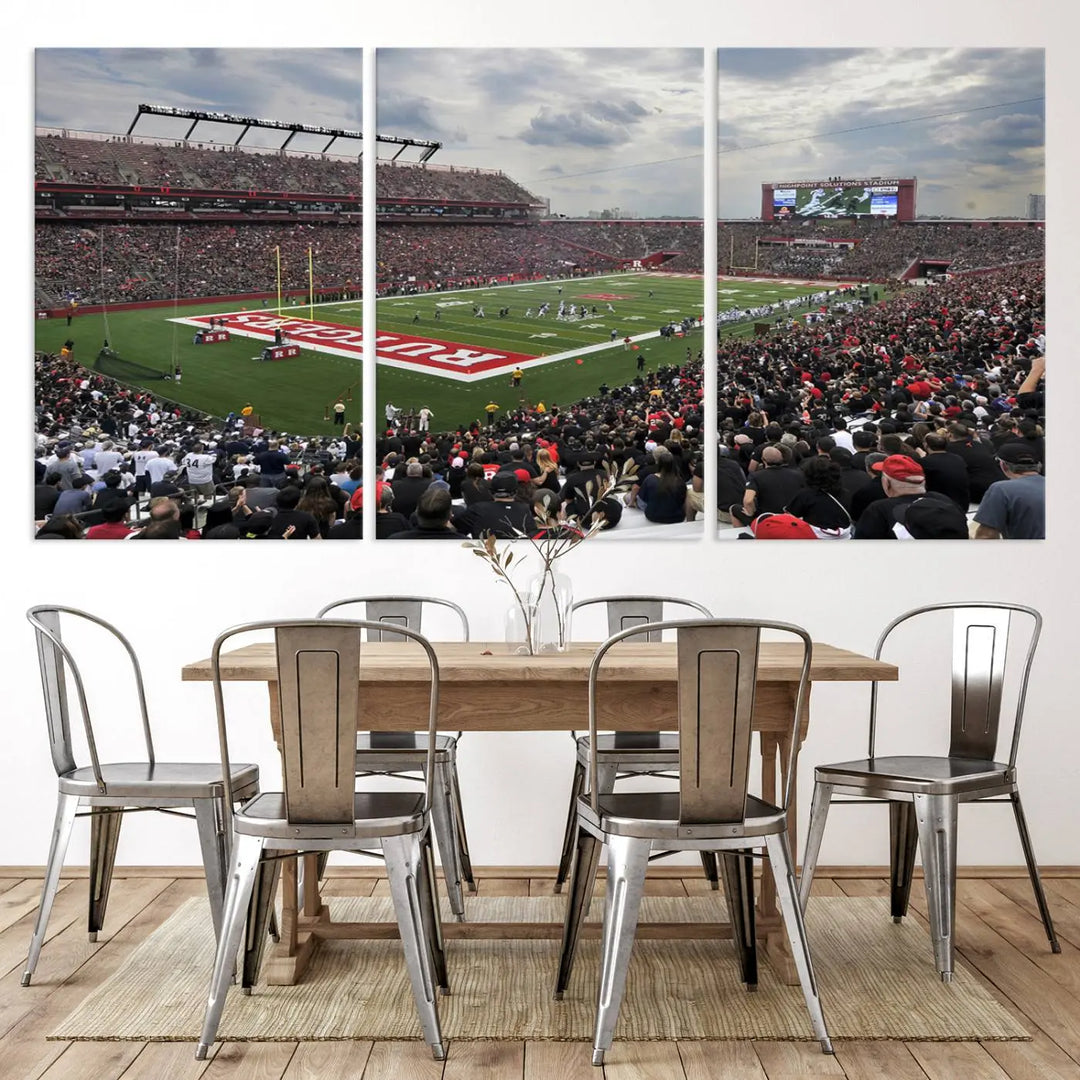 The elegant dining area features a large Rutgers Scarlet Knights Football Team print of SHI Stadium, Piscataway on the wall, boasting a gallery-quality finish.