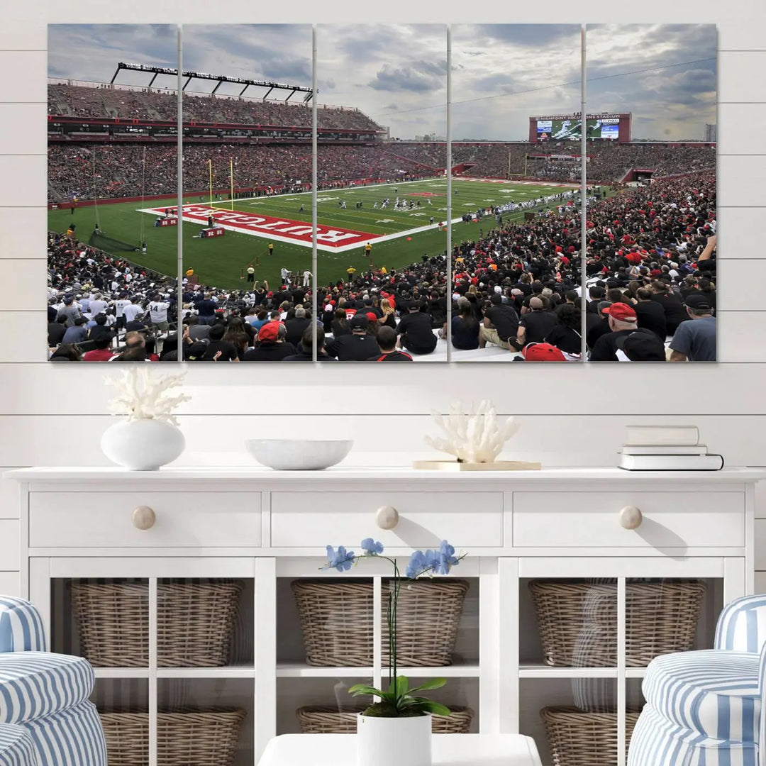 The elegant dining area features a large Rutgers Scarlet Knights Football Team print of SHI Stadium, Piscataway on the wall, boasting a gallery-quality finish.