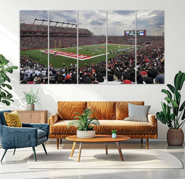 The elegant dining area features a large Rutgers Scarlet Knights Football Team print of SHI Stadium, Piscataway on the wall, boasting a gallery-quality finish.