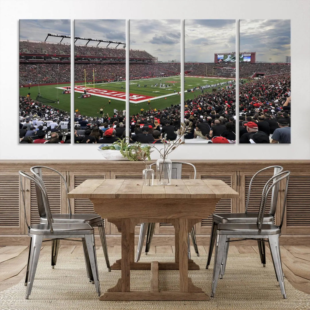 The elegant dining area features a large Rutgers Scarlet Knights Football Team print of SHI Stadium, Piscataway on the wall, boasting a gallery-quality finish.