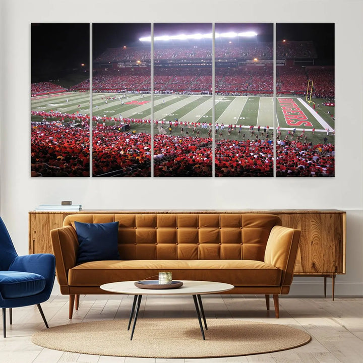 The Rutgers University Scarlet Knights Football Team Print - Piscataway SHI Stadium Wall Art Canvas Print adds an elegant touch to a stylish room. Handmade in the USA, it captures the spirited ambiance of a packed football stadium at night perfectly.