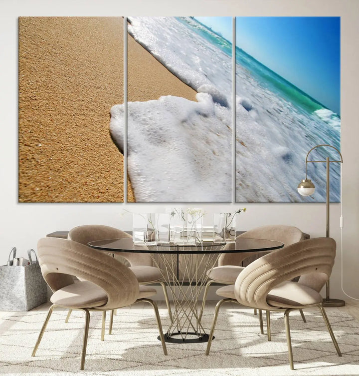 Sandy shoreline close-up ocean wave canvas print. Beach wall art with giclee canvas and gallery wrap, perfect for coastal living decor.