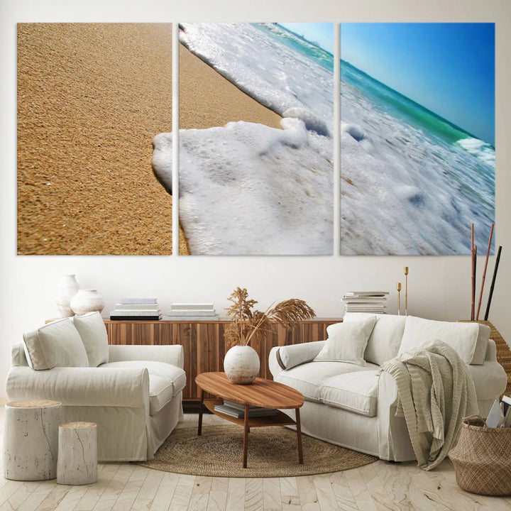 Sandy shoreline close-up ocean wave canvas print. Beach wall art with giclee canvas and gallery wrap, perfect for coastal living decor.