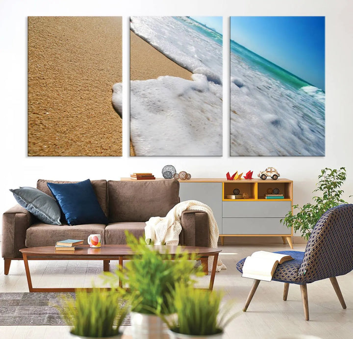 Sandy shoreline close-up ocean wave canvas print. Beach wall art with giclee canvas and gallery wrap, perfect for coastal living decor.