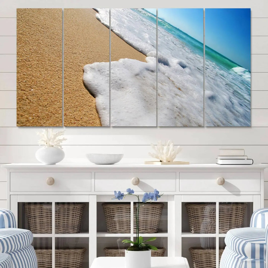 Sandy shoreline close-up ocean wave canvas print. Beach wall art with giclee canvas and gallery wrap, perfect for coastal living decor.