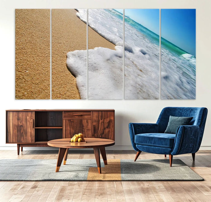 Sandy shoreline close-up ocean wave canvas print. Beach wall art with giclee canvas and gallery wrap, perfect for coastal living decor.