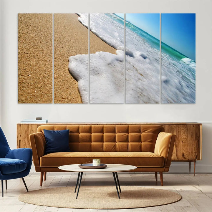 Sandy shoreline close-up ocean wave canvas print. Beach wall art with giclee canvas and gallery wrap, perfect for coastal living decor.