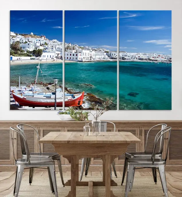 The Santorini Wall Art Canvas Print, showcasing a triptych of a coastal Greek village with white buildings and a turquoise sea, enhances the modern living room.