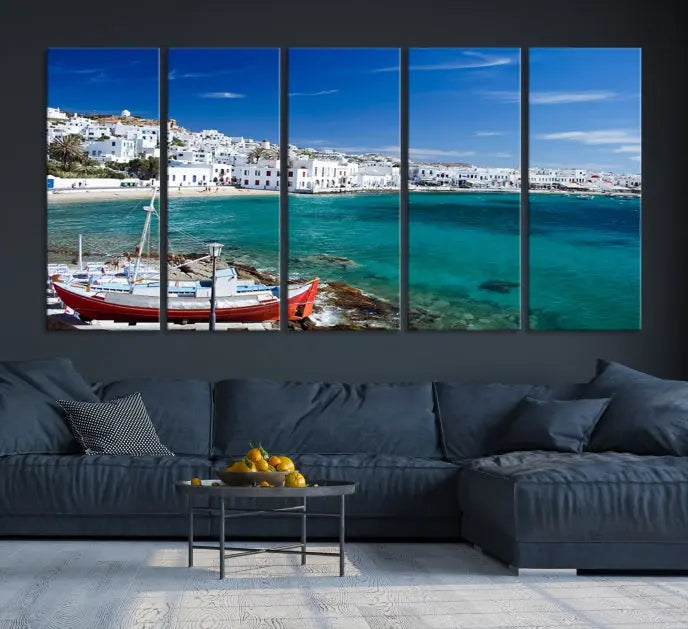 The Santorini Wall Art Canvas Print, showcasing a triptych of a coastal Greek village with white buildings and a turquoise sea, enhances the modern living room.