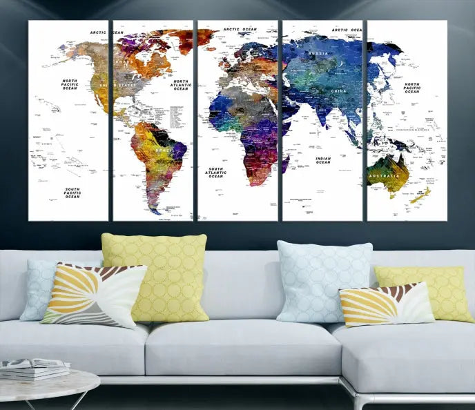 A contemporary living room features the School World Map Canvas Print, a vibrant and multi-panel artwork on museum-quality canvas. This piece is ready to hang, offering both easy installation and enduring appeal.