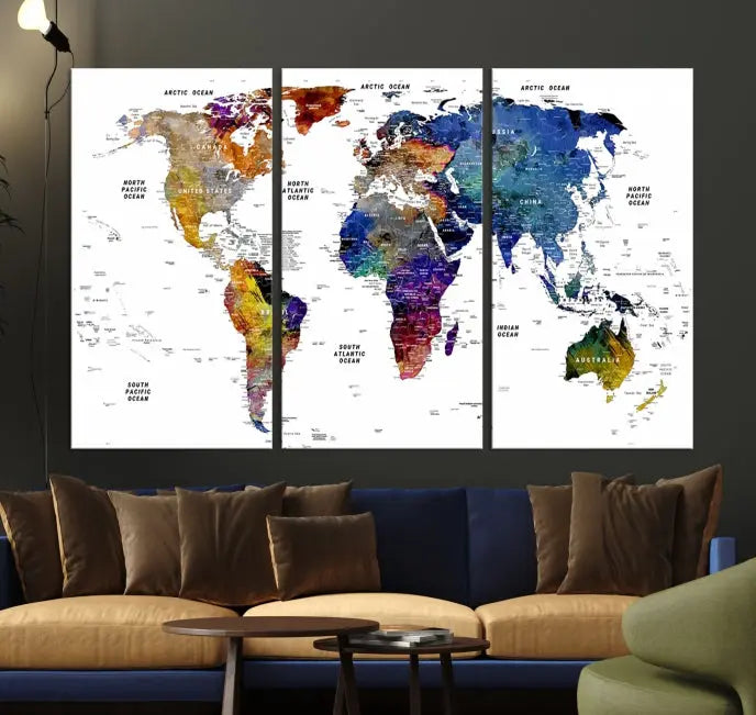 A contemporary living room features the School World Map Canvas Print, a vibrant and multi-panel artwork on museum-quality canvas. This piece is ready to hang, offering both easy installation and enduring appeal.