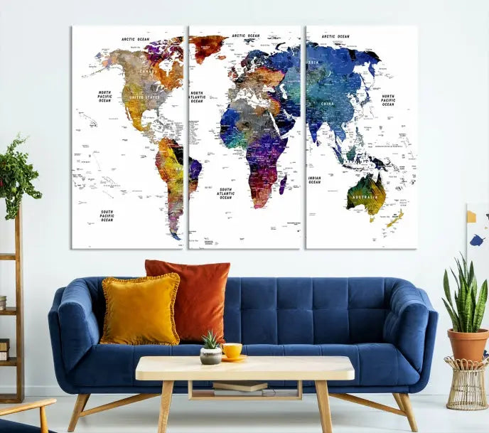 A contemporary living room features the School World Map Canvas Print, a vibrant and multi-panel artwork on museum-quality canvas. This piece is ready to hang, offering both easy installation and enduring appeal.