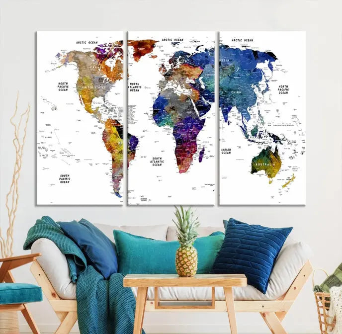 A contemporary living room features the School World Map Canvas Print, a vibrant and multi-panel artwork on museum-quality canvas. This piece is ready to hang, offering both easy installation and enduring appeal.