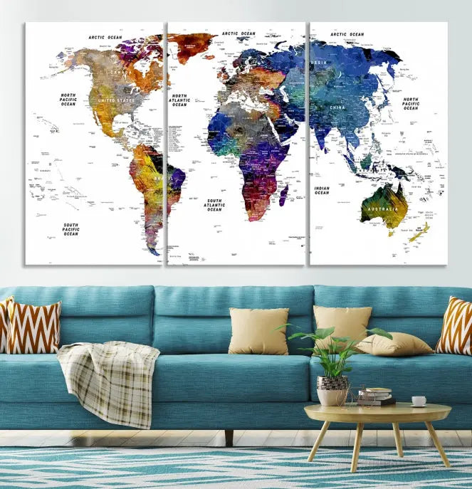 A contemporary living room features the School World Map Canvas Print, a vibrant and multi-panel artwork on museum-quality canvas. This piece is ready to hang, offering both easy installation and enduring appeal.