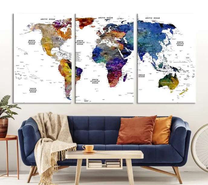 A contemporary living room features the School World Map Canvas Print, a vibrant and multi-panel artwork on museum-quality canvas. This piece is ready to hang, offering both easy installation and enduring appeal.