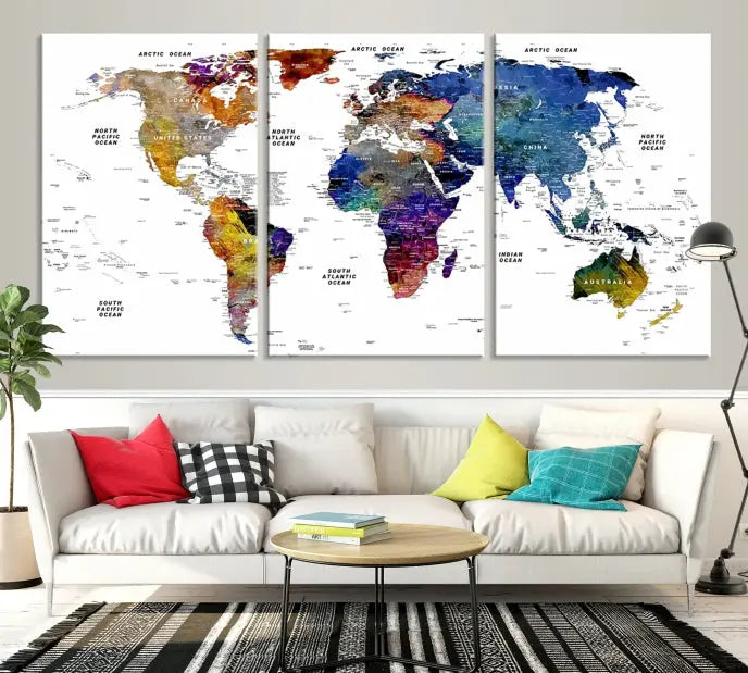 A contemporary living room features the School World Map Canvas Print, a vibrant and multi-panel artwork on museum-quality canvas. This piece is ready to hang, offering both easy installation and enduring appeal.